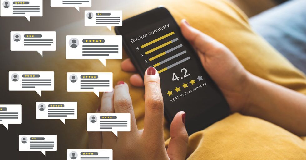Big 5 Topics for They Ask, You Answer Marketing Success 7 Photo of hands scrolling through customer reviews on a phone