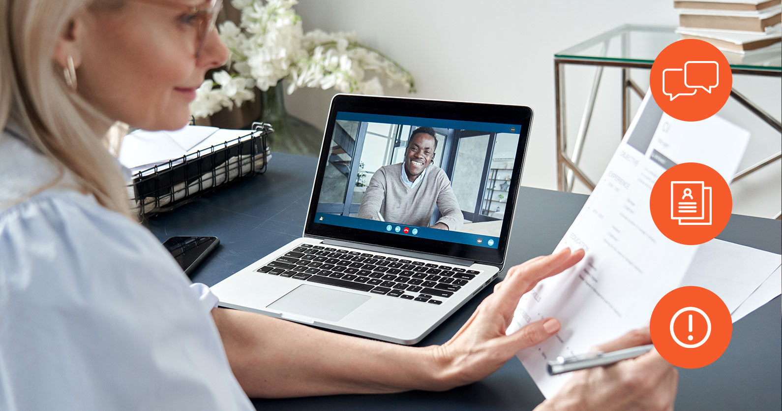 How To Find And Hire The Best Virtual Team 2 Hiring a Virtual Team: Woman on a call with a candidate